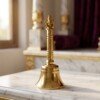 Brass_Ganpati_hand_bell_2K_202607091700 Handcrafted Pure Brass Ganesha Pooja Hand Bell (12 cm / 4.72 Inches) – Traditional Carved Brass Ghanti with Lord Ganesha Finial Handle