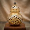Brass_Garbo_reference_design_202607151125 Handcrafted Dual-Tone Pure Brass Navratri Garbo (7 Inches / 450g) – Gold & Silver Plated Swastik & Floral Cutout Jaali Work