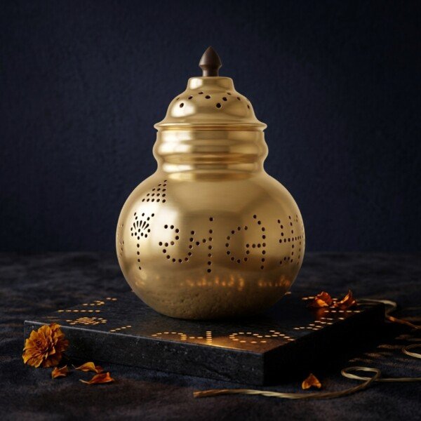 Brass_Garbo_with_oil_diya_202607151110 Heritage Pure Brass Navratri Garbo (7 Inches / 450g) – Hand-Perforated "Jay Ambe" Design with Dome Lid