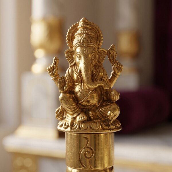 Brass_bell_with_Ganpati_idol_202607091700 Handcrafted Pure Brass Ganesha Pooja Hand Bell (12 cm / 4.72 Inches) – Traditional Carved Brass Ghanti with Lord Ganesha Finial Handle