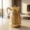 Brass_water_jug_engraved_paisley_202607101017 Hira Craft Royal Paisley Engraved Pure Brass Water Pitcher with Brass Lid (1.5 Liters) – Royal Vintage Handle