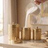 make_it_3_4_2K_202607232043 (1) Luxury Handcrafted Pure Brass Kitchen Canister Jars (Set of 3 - Small, Medium, Large) – Matte Gold Finish with Traditional Geometric Relief Engravings & Ball Knob Lids