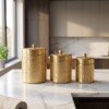 make_it_3_4_2K_202607232043 Luxury Handcrafted Pure Brass Kitchen Canister Jars (Set of 3 - Small, Medium, Large) – Matte Gold Finish with Traditional Geometric Relief Engravings & Ball Knob Lids