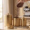 make_it_3_4_2K_202607232043 (2) Luxury Handcrafted Pure Brass Kitchen Canister Jars (Set of 3 - Small, Medium, Large) – Matte Gold Finish with Traditional Geometric Relief Engravings & Ball Knob Lids